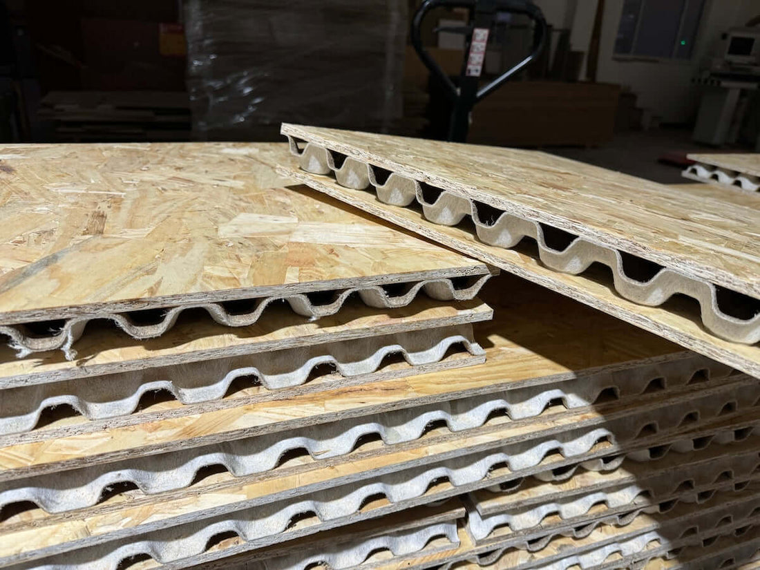 Stacked natural fibre boards showcasing eco-friendly construction materials for sustainable building projects.