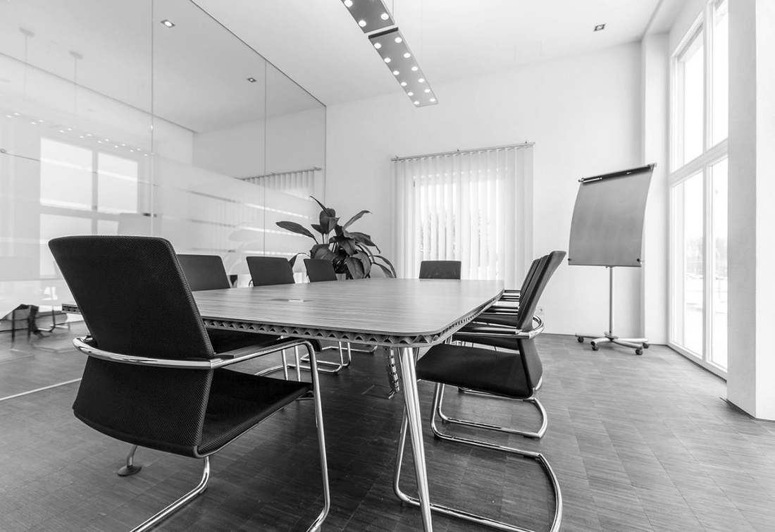 Modern conference room with sleek furniture made from natural fiber board (NFB) showcasing sustainable design benefits